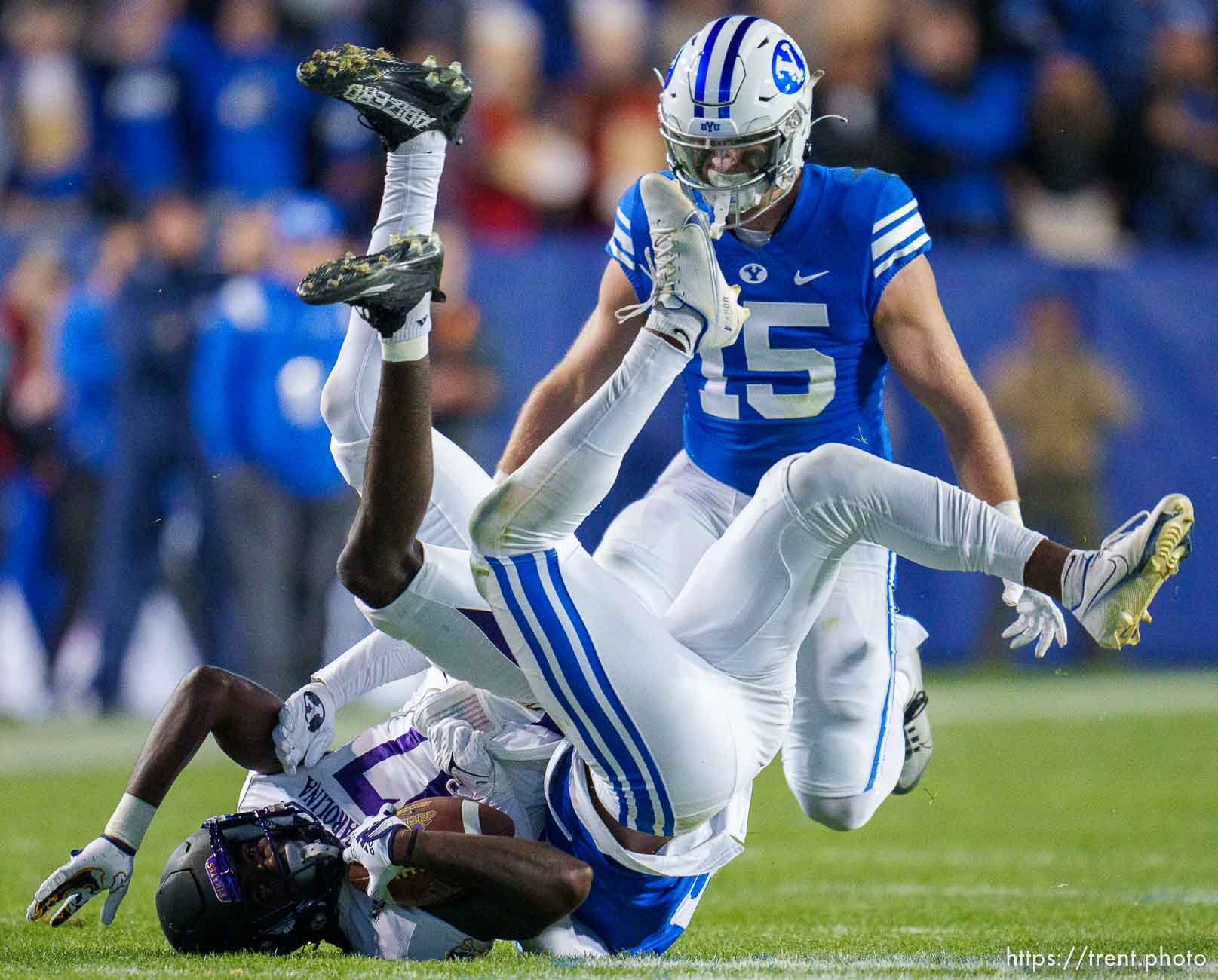 (Trent Nelson  |  The Salt Lake Tribune) Brigham Young Cougars defensive back Kaleb Hayes (18) brings down East Carolina Pirates wide receiver Kerry King (17) as BYU hosts East Carolina, NCAA football in Provo on Friday, Oct. 28, 2022.