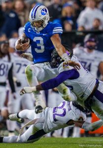 (Trent Nelson  |  The Salt Lake Tribune) Brigham Young Cougars quarterback Jaren Hall (3) runs the ball as BYU hosts East Carolina, NCAA football in Provo on Friday, Oct. 28, 2022.