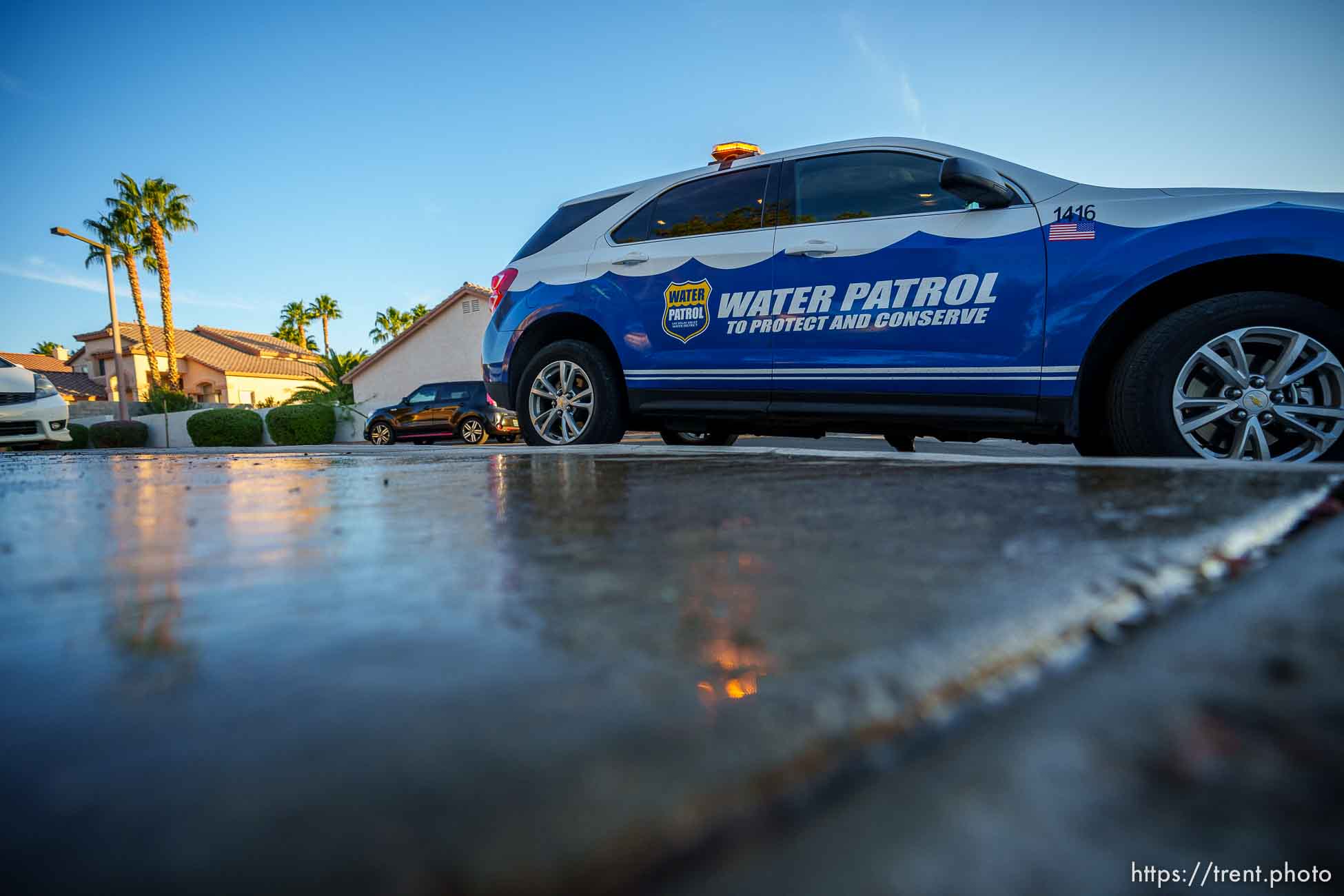 (Trent Nelson  |  The Salt Lake Tribune) Salvador Polanco-Gamez, a conservation aide with the Las Vegas Valley Water District, patrols in Summerlin, a community in the Las Vegas Valley, Nevada on Thursday, Sept. 29, 2022. When runoff water from a home's sprinklers reaches the street, Polanco-Gamez stops to document the situation and notify the homeowner.