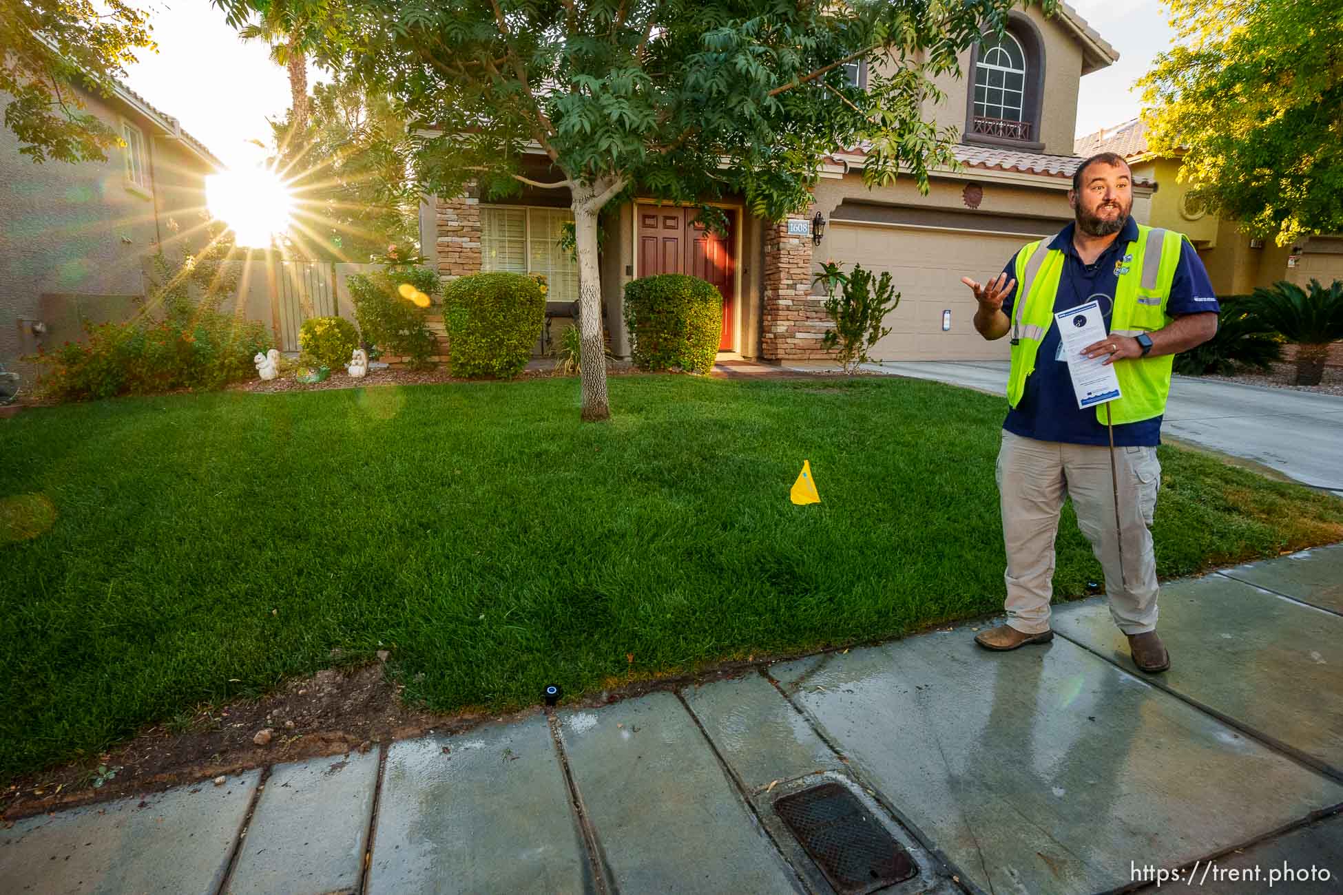 (Trent Nelson  |  The Salt Lake Tribune) Salvador Polanco-Gamez, a conservation aide with the Las Vegas Valley Water District, documents a leak in a sprinkler system in Summerlin, a community in the Las Vegas Valley, Nevada on Thursday, Sept. 29, 2022.