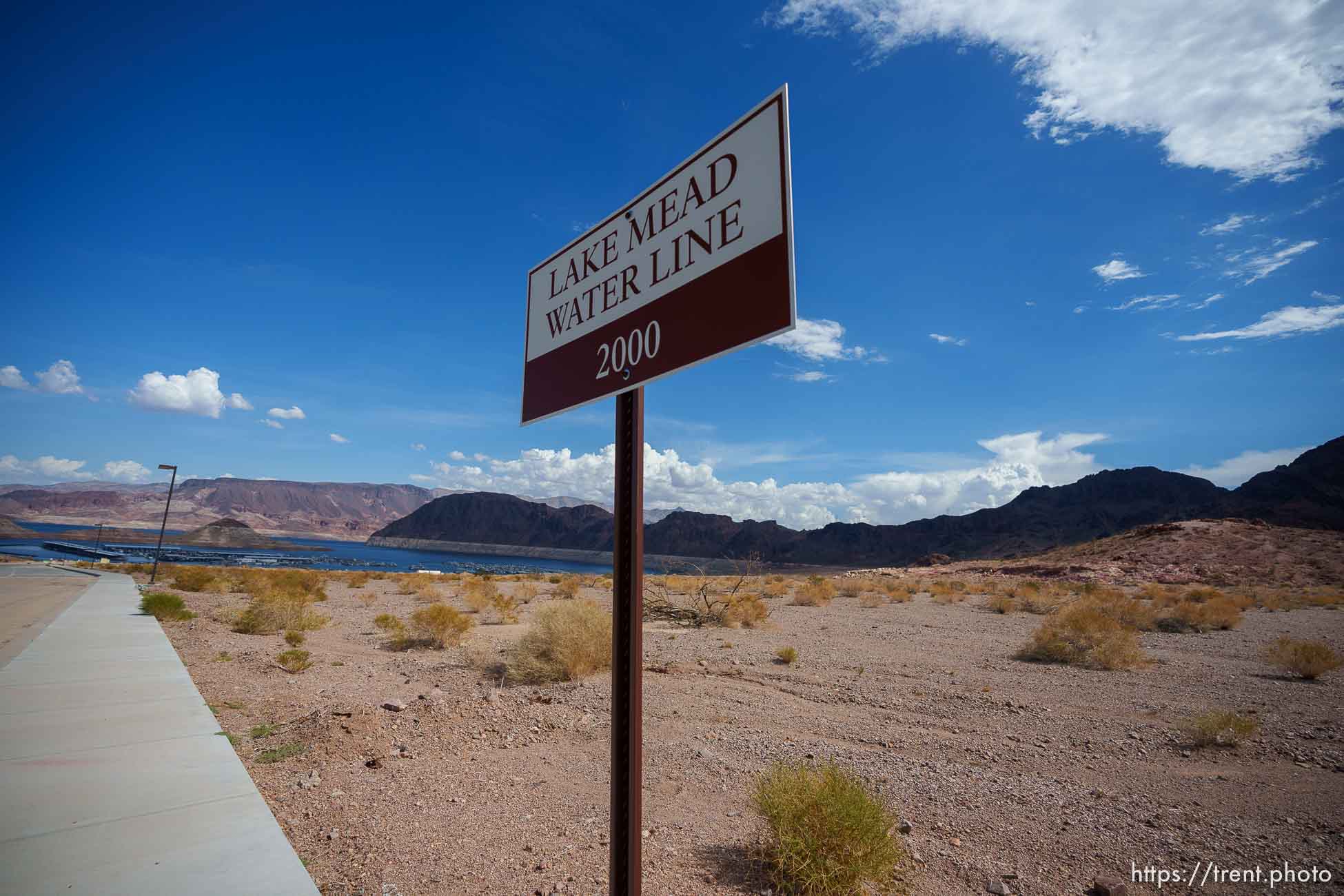 (Trent Nelson  |  The Salt Lake Tribune) A sign at the Hemenway Harbor launch ramp marks the water line at Lake Mead in 2000, contrasting with the current low water levels in Nevada, on Thursday, Sept. 29, 2022.