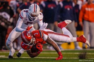 (Trent Nelson  |  The Salt Lake Tribune) Utah Utes quarterback Ja'Quinden Jackson (3) dives for yardage as the University of Utah hosts Arizona, NCAA football in Salt Lake City on Saturday, Nov. 5, 2022.