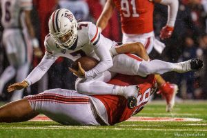 (Trent Nelson  |  The Salt Lake Tribune) Utah Utes defensive tackle Aliki Vimahi (95) sacks Arizona Wildcats quarterback Jayden de Laura (7) as the University of Utah hosts Arizona, NCAA football in Salt Lake City on Saturday, Nov. 5, 2022.