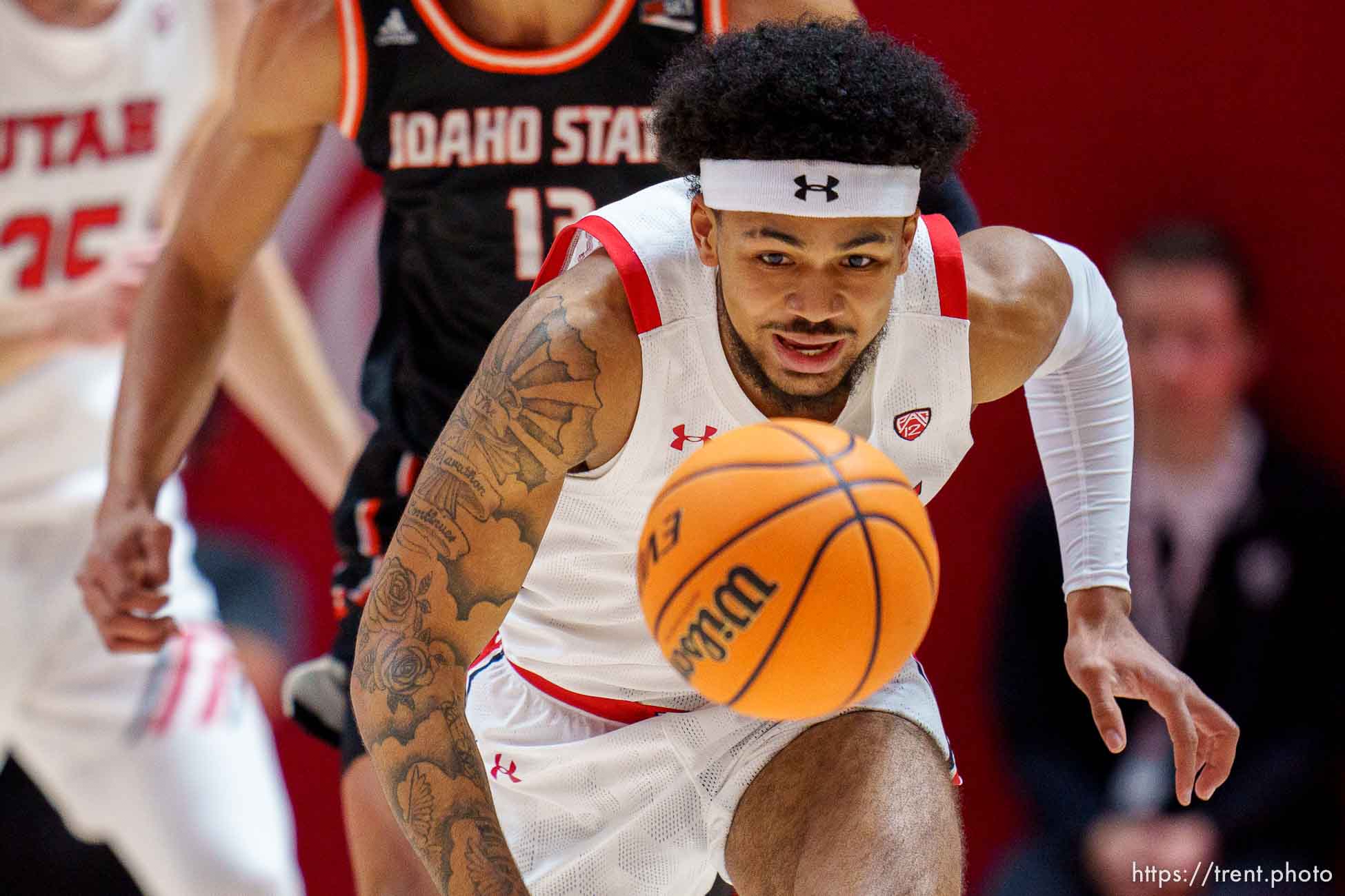 (Trent Nelson  |  The Salt Lake Tribune) Utah Utes guard Mike Saunders Jr. (2) chases down a loose ball as the University of Utah hosts Idaho State, NCAA basketball in Salt Lake City on Monday, Nov. 14, 2022.