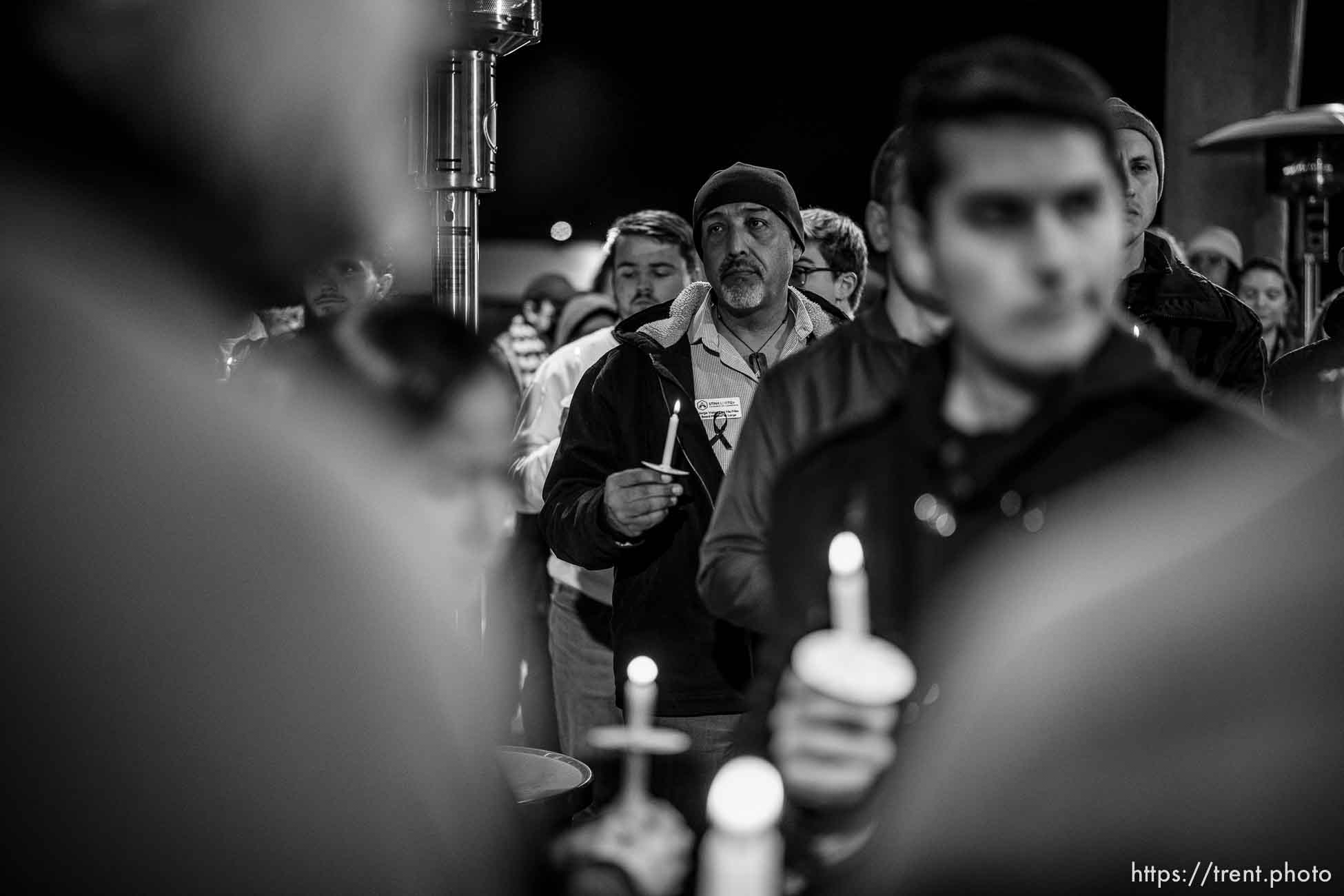 (Trent Nelson  |  The Salt Lake Tribune) People gather at the Utah Pride Center in Salt Lake City on Monday, Nov. 21, 2022 for a candlelight vigil for the victims of a shooting in Colorado Springs.