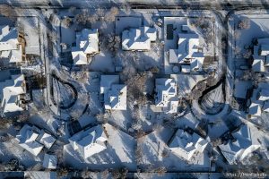 (Trent Nelson  |  The Salt Lake Tribune) Fresh snow on homes in South Jordan on Thursday, Dec. 8, 2022.