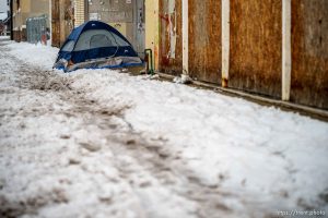 (Trent Nelson  |  The Salt Lake Tribune) A tent in front of an closed furniture store on Salt Lake City's State Street, Tuesday, Dec. 13, 2022.