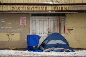 (Trent Nelson  |  The Salt Lake Tribune) snow and tent, state street on Tuesday, Dec. 13, 2022.