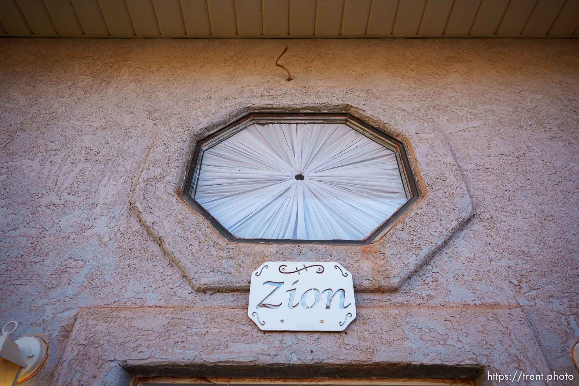 (Trent Nelson  |  The Salt Lake Tribune) Samuel Bateman's Blue house in Colorado City, Ariz., on Sunday, Sept. 18, 2022. window, zion, door the FBI entered