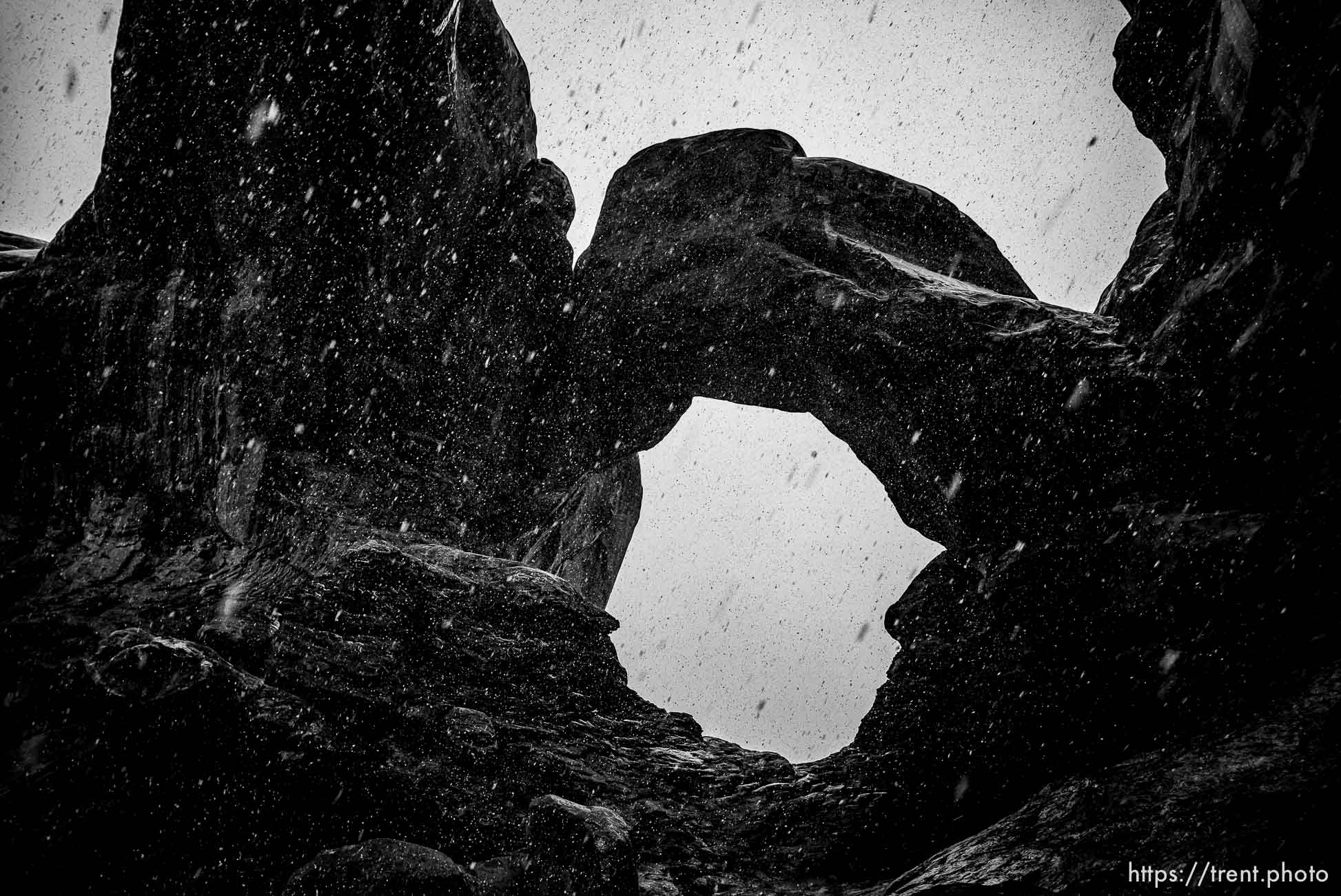 double arch in the snow, arches national park, on Monday, Jan. 2, 2023.