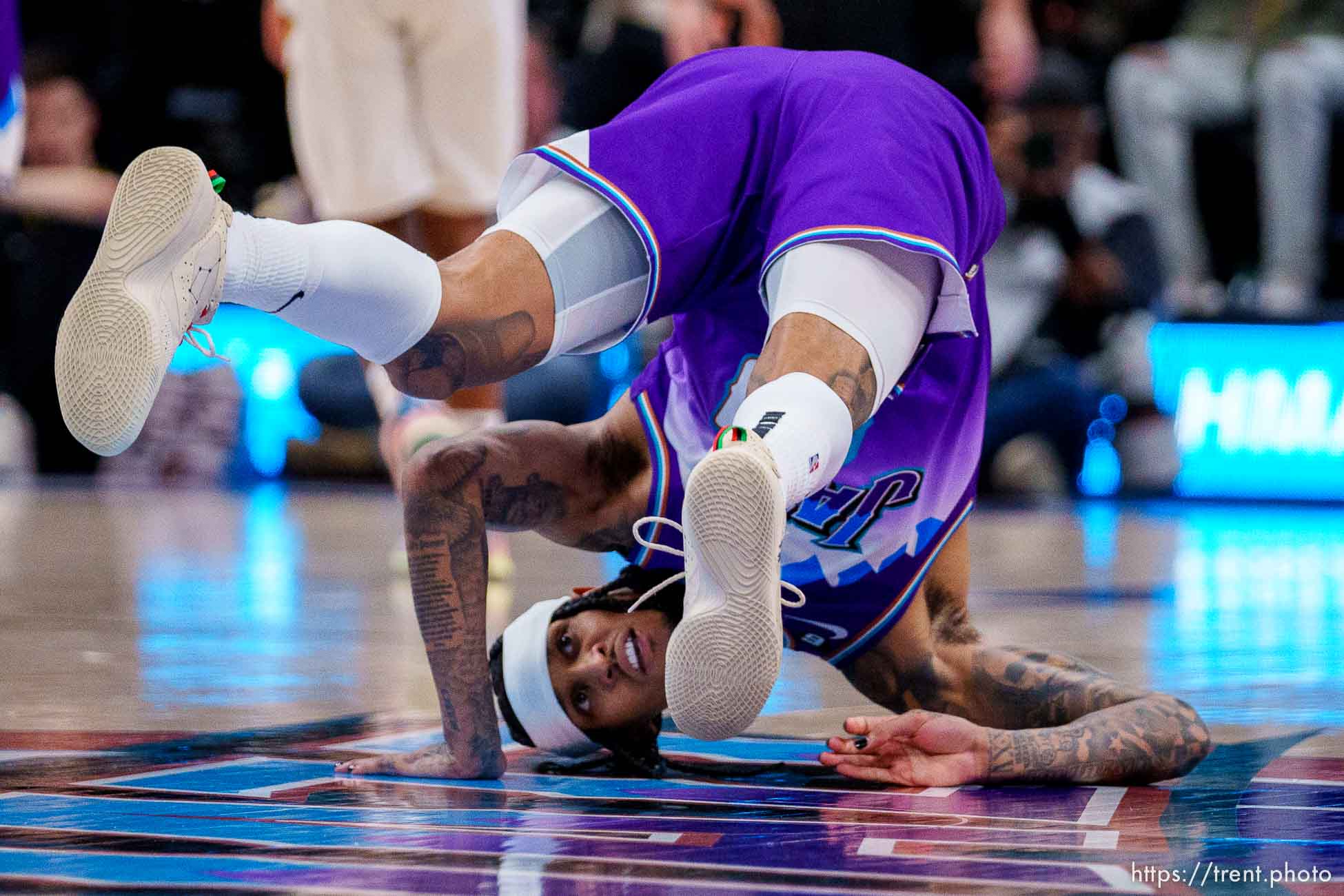 (Trent Nelson  |  The Salt Lake Tribune) Utah Jazz guard Jordan Clarkson (00) flips over after being fouled while hitting a three-point shot late in the game, as the Utah Jazz host the Cleveland Cavaliers, NBA basketball in Salt Lake City on Tuesday, Jan. 10, 2023.