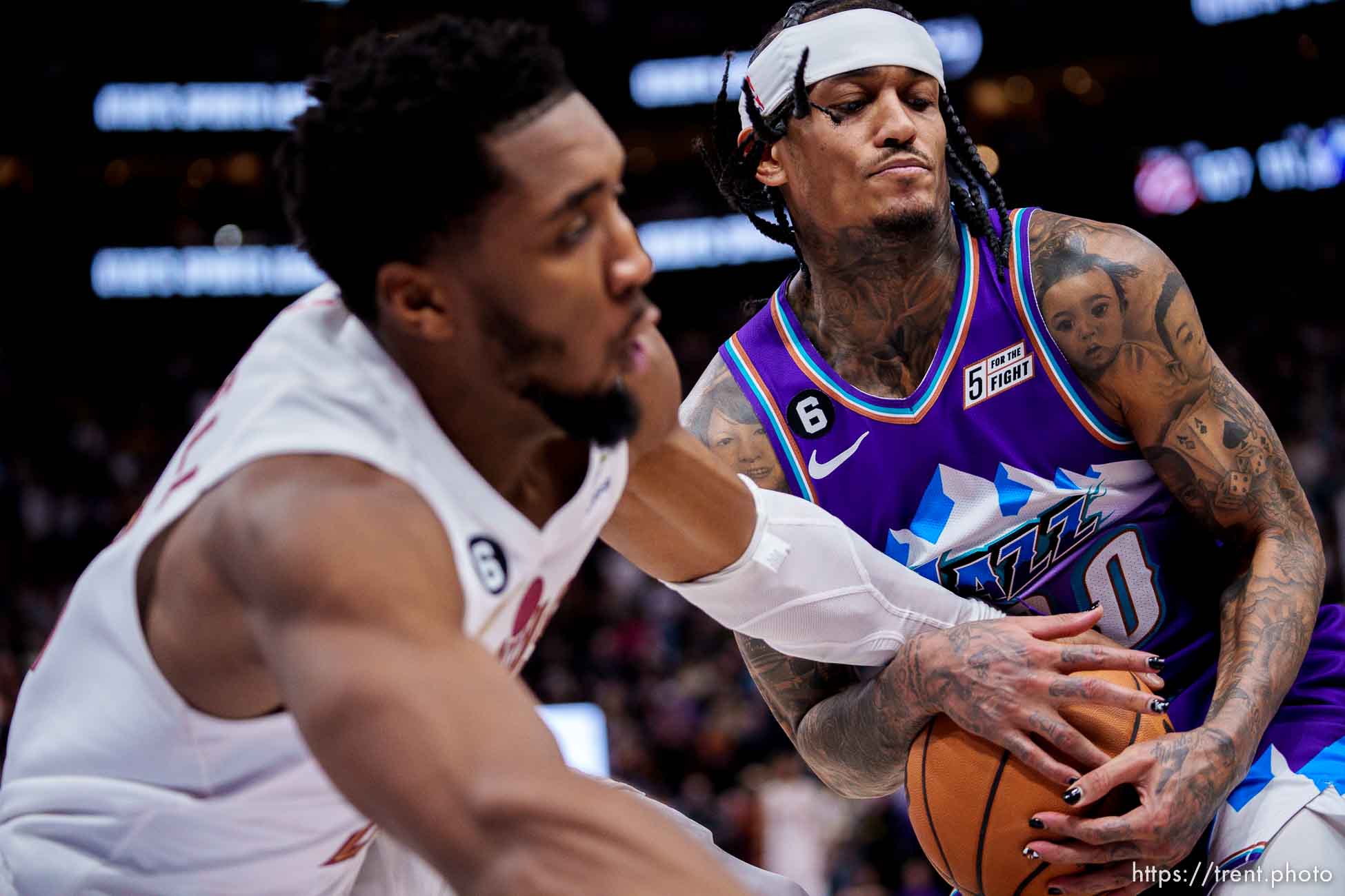 (Trent Nelson  |  The Salt Lake Tribune) Utah Jazz guard Jordan Clarkson (00) pulls a loose ball away from Cleveland Cavaliers guard Donovan Mitchell (45) as the Utah Jazz host the Cleveland Cavaliers, NBA basketball in Salt Lake City on Tuesday, Jan. 10, 2023.