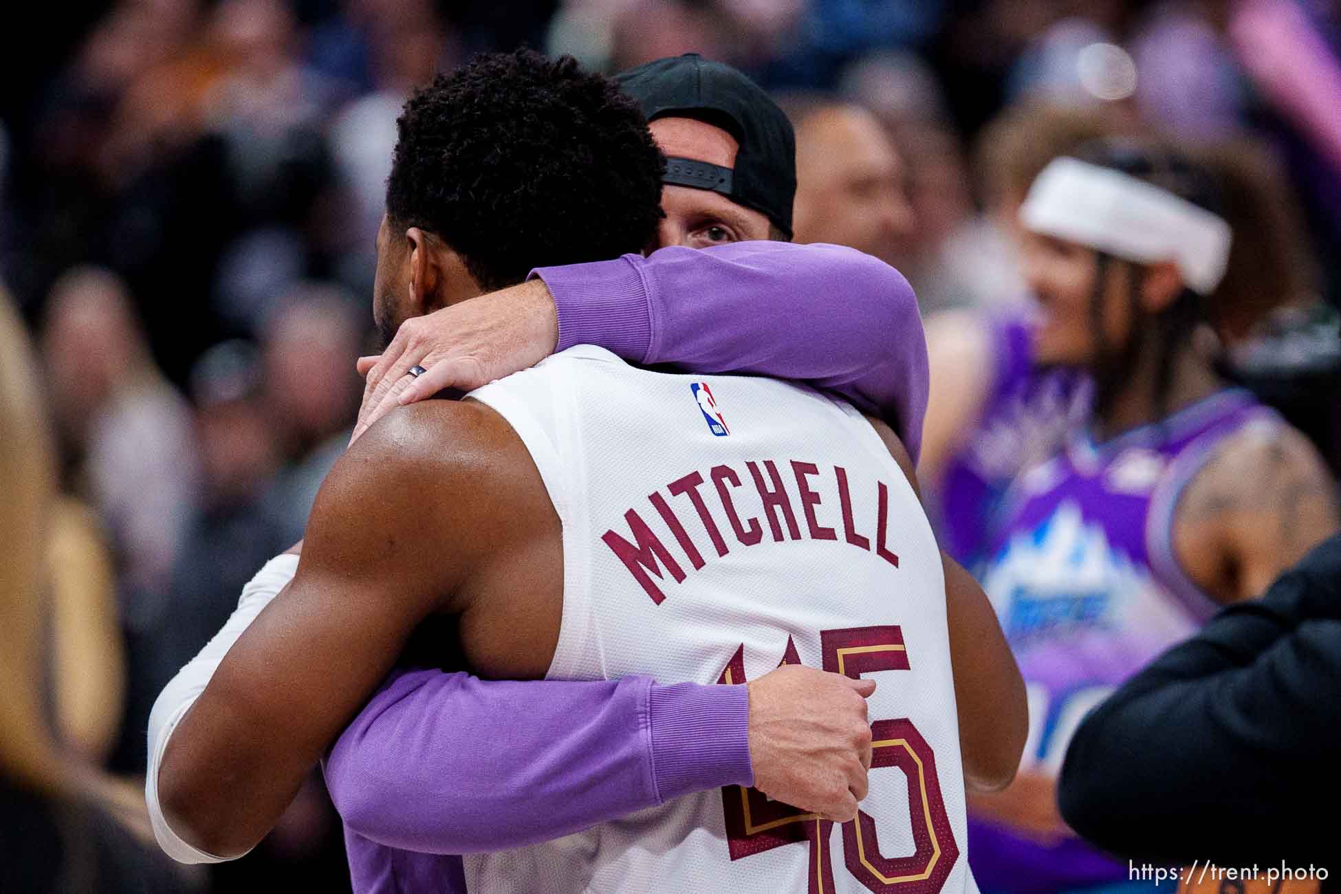 (Trent Nelson  |  The Salt Lake Tribune) Ryan Smith and Cleveland Cavaliers guard Donovan Mitchell (45) as the Utah Jazz host the Cleveland Cavaliers, NBA basketball in Salt Lake City on Tuesday, Jan. 10, 2023.