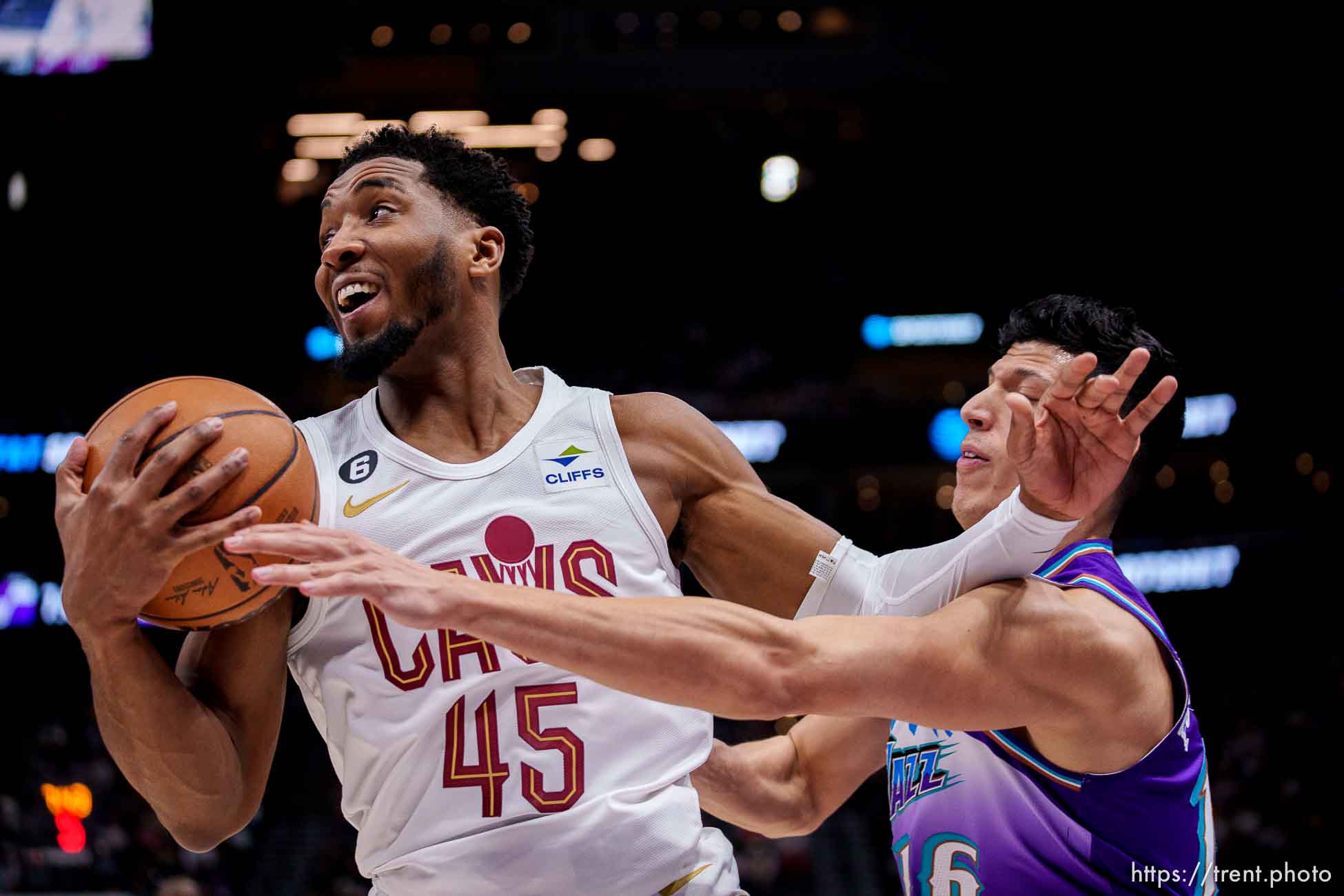 (Trent Nelson  |  The Salt Lake Tribune) Cleveland Cavaliers guard Donovan Mitchell (45) steals a pass intended for Utah Jazz forward Simone Fontecchio (16) as the Utah Jazz host the Cleveland Cavaliers, NBA basketball in Salt Lake City on Tuesday, Jan. 10, 2023.