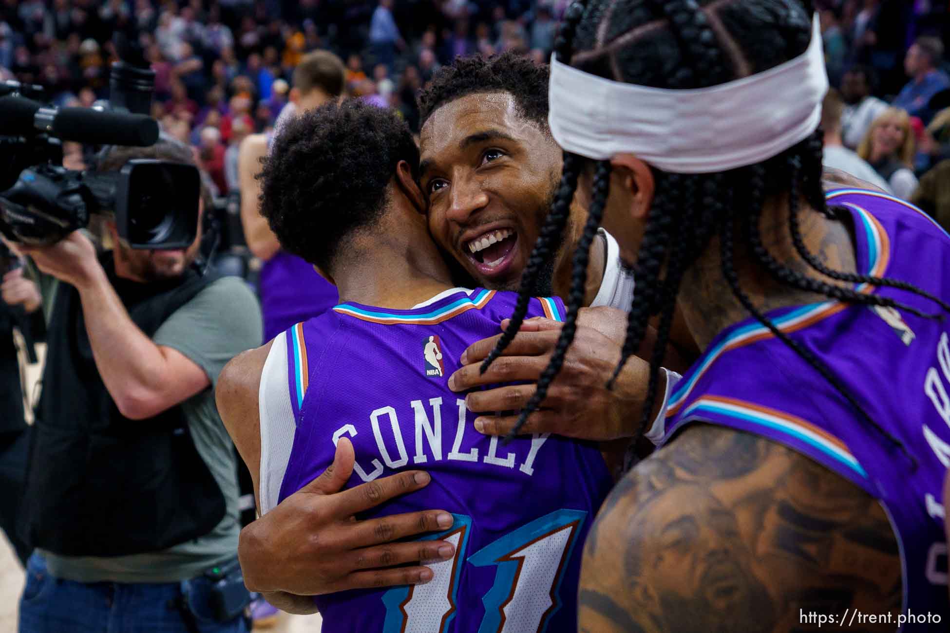 (Trent Nelson  |  The Salt Lake Tribune) Cleveland Cavaliers guard Donovan Mitchell (45) embraces Utah Jazz guard Mike Conley (11) and Utah Jazz guard Jordan Clarkson (00) after the game, as the Utah Jazz host the Cleveland Cavaliers, NBA basketball in Salt Lake City on Tuesday, Jan. 10, 2023.