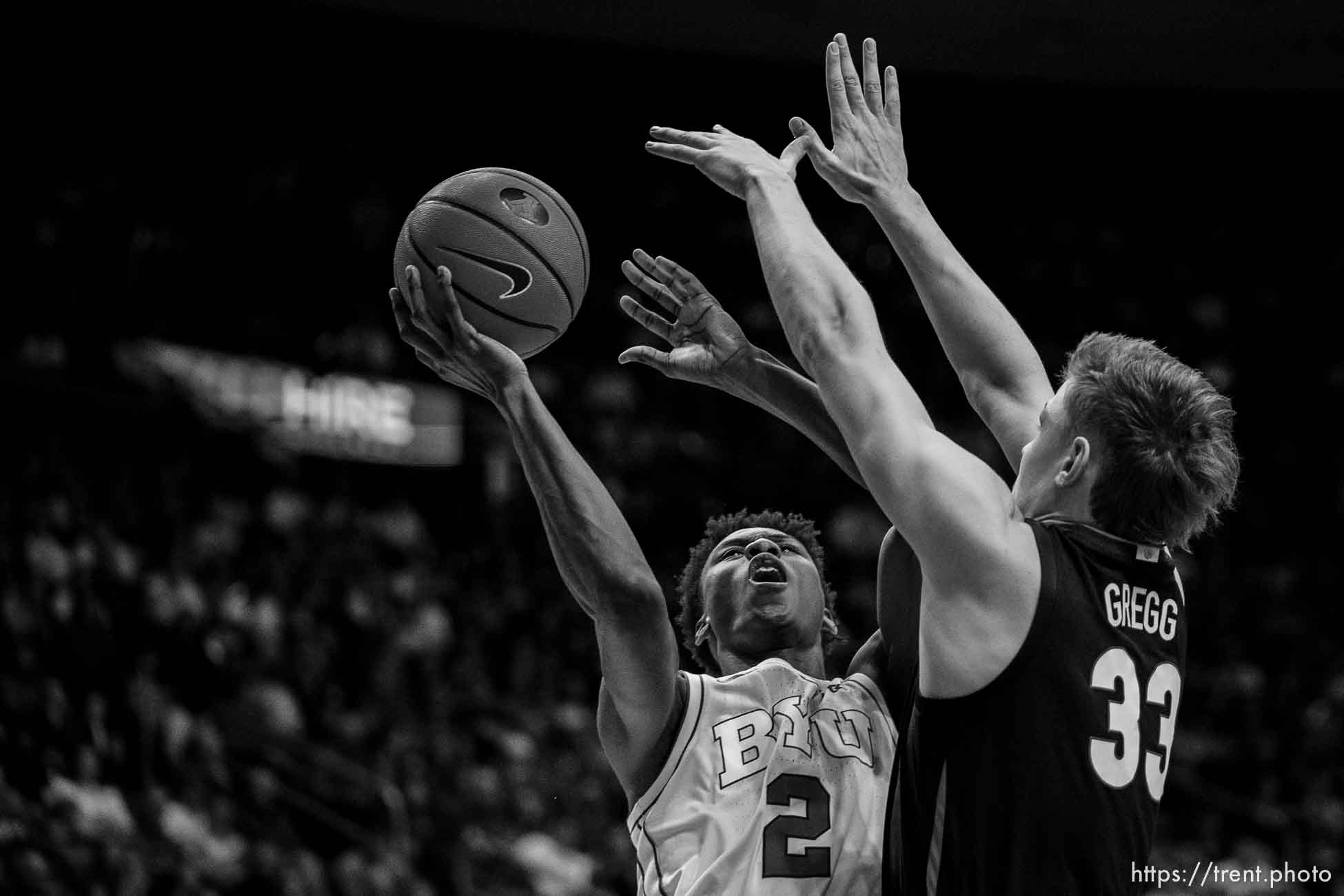 (Trent Nelson  |  The Salt Lake Tribune) Brigham Young Cougars guard Jaxson Robinson (2) defended by Gonzaga Bulldogs forward Ben Gregg (33) as BYU hosts Gonzaga, NCAA basketball in Provo on Thursday, Jan. 12, 2023.