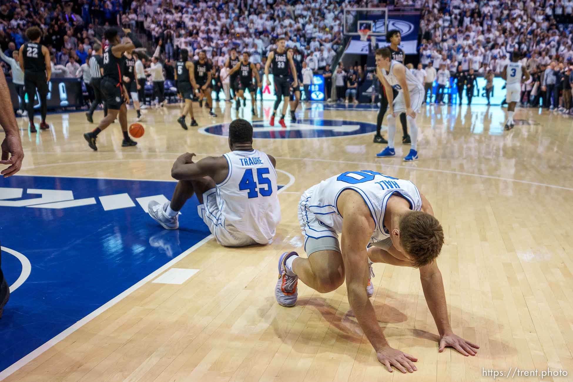 (Trent Nelson  |  The Salt Lake Tribune) Brigham Young Cougars guard Dallin Hall (30) and Brigham Young Cougars forward Fousseyni Traore (45) react to a one-point loss as BYU hosts Gonzaga, NCAA basketball in Provo on Thursday, Jan. 12, 2023.