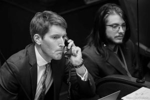 (Trent Nelson  |  The Salt Lake Tribune) Sen. Nate Blouin, D-Salt Lake City, as the Senate gives final passage to a bill aiming to crack down on the ability of doctors to prescribe hormone therapy for minors who are transgender, at the Capitol building in Salt Lake City on Friday January 20, 2023. At right is intern Ari Webb, whose statement Blouin read during the vote.