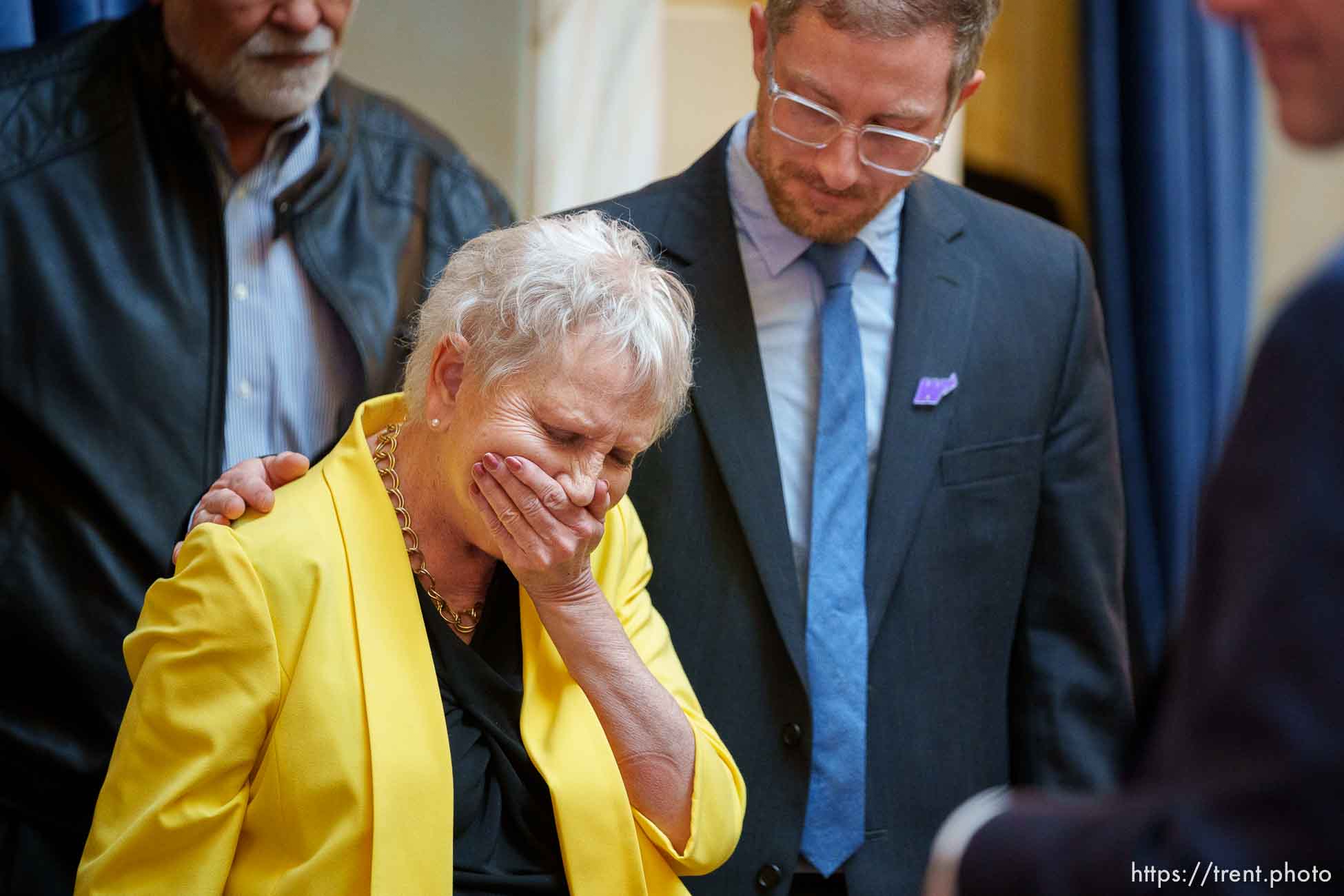 (Trent Nelson  |  The Salt Lake Tribune) Former Sen. Karen Mayne is honored in the Senate Chamber in Salt Lake City on Friday, Feb. 3, 2023. At right is her son, Paul Mayne.