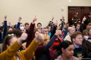 (Trent Nelson  |  The Salt Lake Tribune) People show their support for comments opposing H.B. 467 as the House Judiciary Committee meets in Salt Lake City on Wednesday, Feb. 15, 2023.