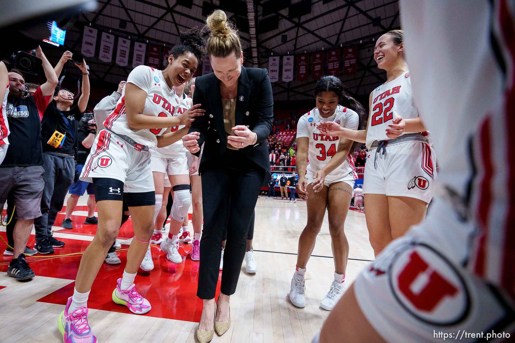 (Trent Nelson  |  The Salt Lake Tribune) Utah Utes head coach Lynne Roberts does a dance after the win as Utah hosts Princeton, NCAA basketball in Salt Lake City on Sunday, March 19, 2023.