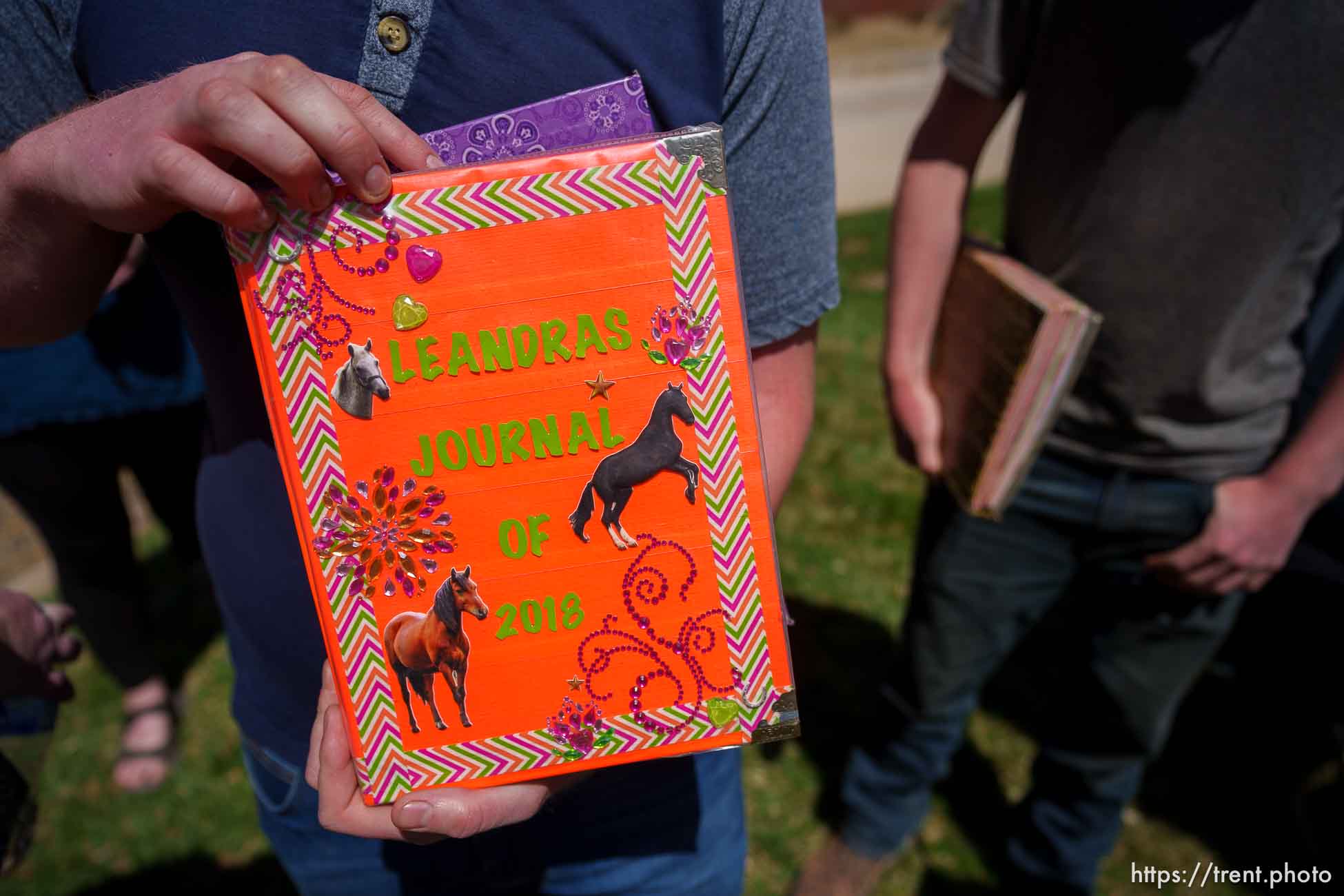 (Trent Nelson  |  The Salt Lake Tribune) Kyle Black holds one of the journals his sister Leandra kept while being hidden away from her family, at a news conference in Cedar City on Monday, April 17, 2023.