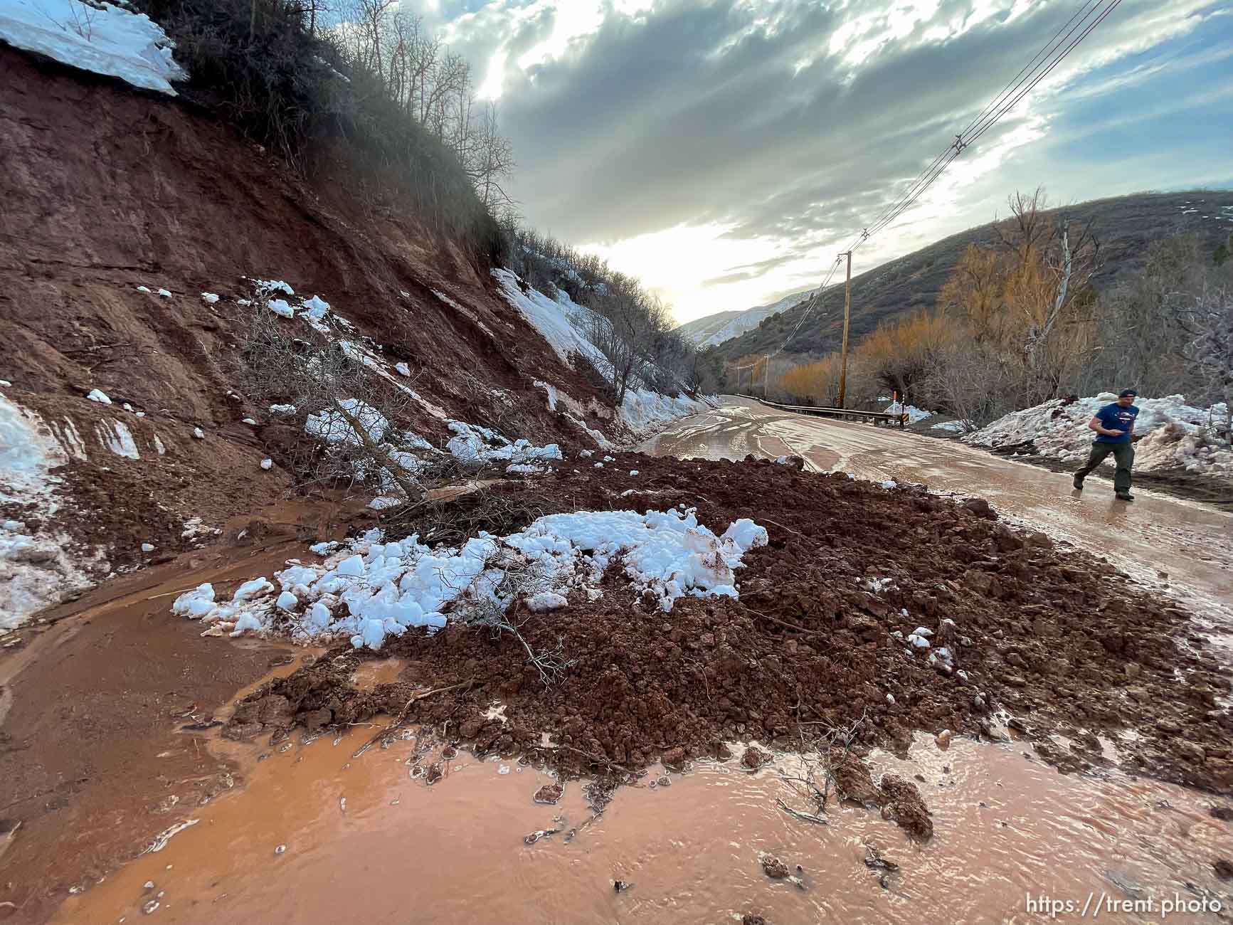 (Trent Nelson  |  The Salt Lake Tribune) A mudslide blocks a lane of traffic in Emigration Canyon on Wednesday, April 12, 2023.