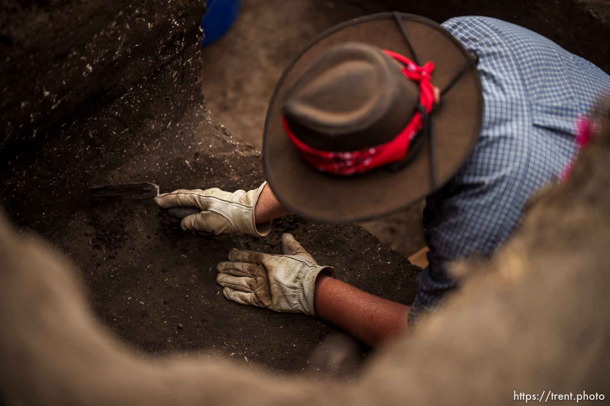 (Trent Nelson  |  The Salt Lake Tribune) Faculty and students from BYU's 2023 Archaeological Field School explore the remains of a 1000-year-old Fremont Indian village at the Hinckley Mounds in west Provo on Wednesday, June 14, 2023. Jacob Robinson