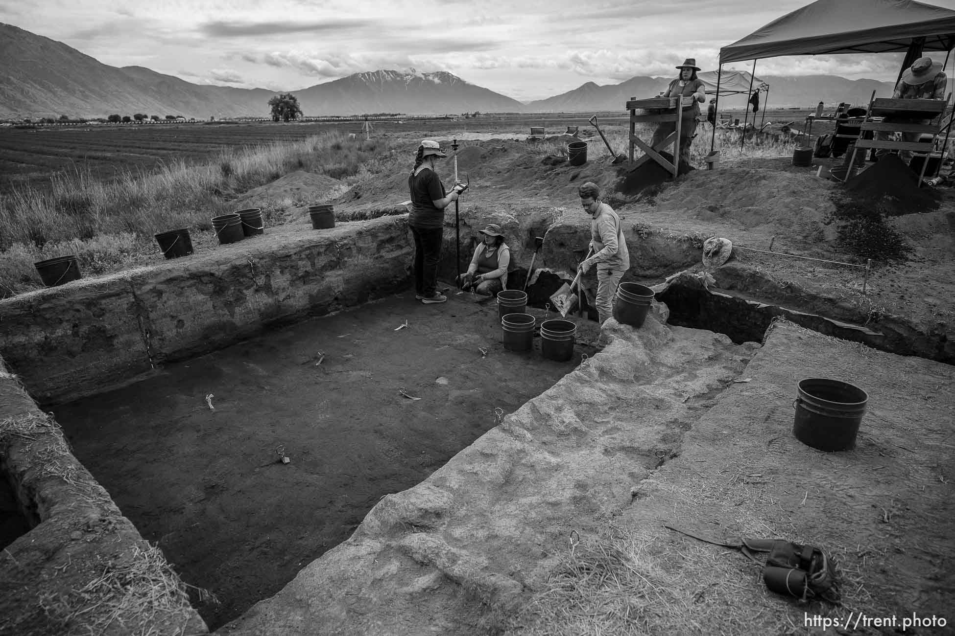 (Trent Nelson  |  The Salt Lake Tribune) Faculty and students from BYU's 2023 Archaeological Field School explore the remains of a 1000-year-old Fremont village at the Hinckley Mounds in west Provo on Wednesday, June 14, 2023.