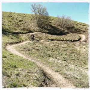 Laura Nelson mountain biking on Sunday, April 30, 2023.