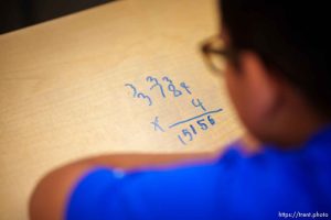 (Trent Nelson  |  The Salt Lake Tribune) A student doing math in Andrew Bernstain's fourth grade class at Heber Valley Elementary School in Heber on Wednesday, July 5, 2023.