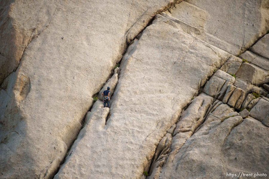 (Trent Nelson  |  The Salt Lake Tribune) A rock climber on a granite face at the Alpenbock Loop in Little Cottonwood Canyon on Friday, July 21, 2023.