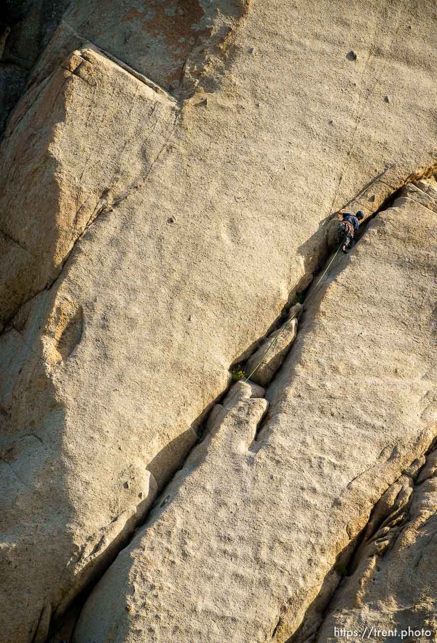 (Trent Nelson  |  The Salt Lake Tribune) A rock climber on a granite face at the Alpenbock Loop in Little Cottonwood Canyon on Friday, July 21, 2023.