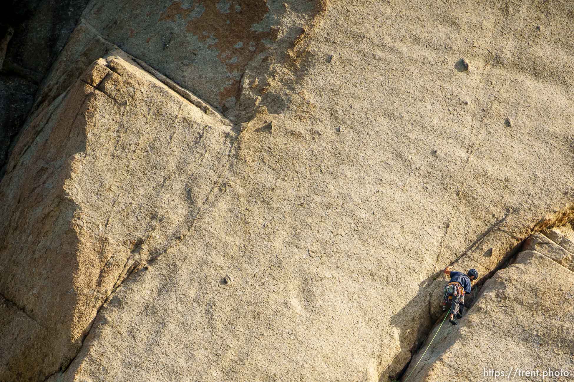 (Trent Nelson  |  The Salt Lake Tribune) A rock climber on a granite face at the Alpenbock Loop in Little Cottonwood Canyon on Friday, July 21, 2023.