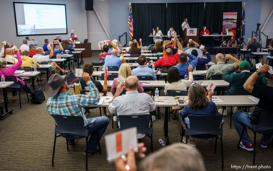 (Trent Nelson  |  The Salt Lake Tribune) Attendees vote in favor of a resolution supporting Donald Trump as the Utah Republican Party holds its quarterly State Central Committee meeting in Sandy on Saturday, Aug. 19, 2023.