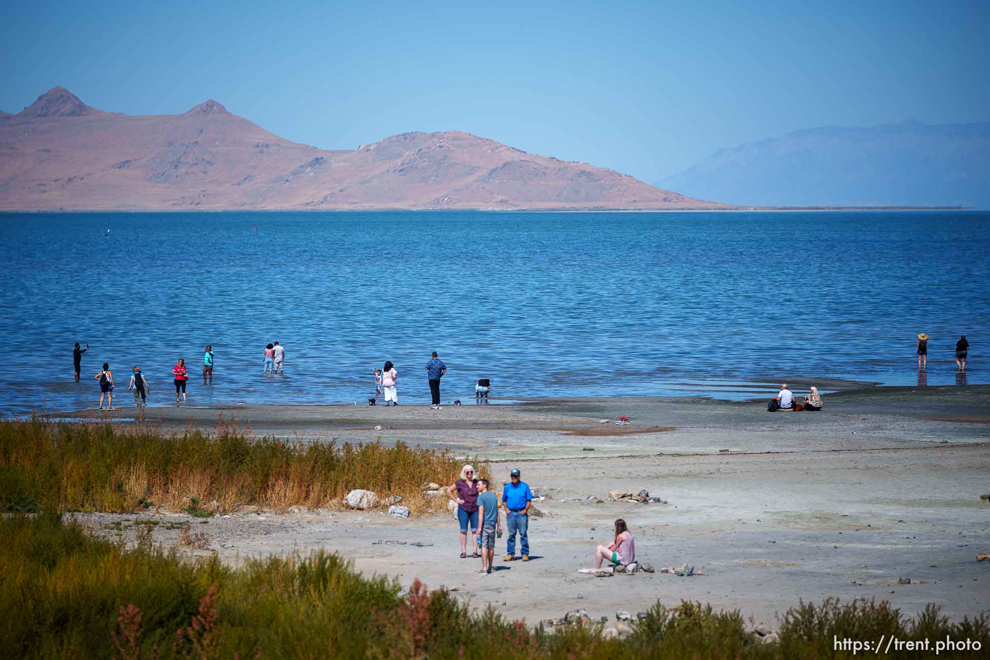 (Trent Nelson  |  The Salt Lake Tribune) People on the shore of the Great Salt Lake on Saturday, Sept. 16, 2023.