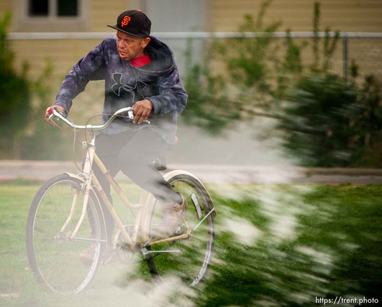 man on bike, redwood road, Thursday September 21, 2023.