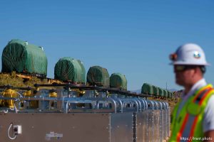 (Trent Nelson  |  The Salt Lake Tribune) Electrolyzers on train cars at the construction site for a new green-energy system at International Power Project's coal-fired power plant in Delta on Thursday, Oct. 5, 2023.