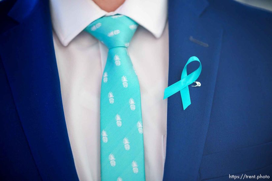 (Trent Nelson | The Salt Lake Tribune) Plaintiffs and their supporters wear teal ribbons ahead of the Utah Supreme Court hearing an appeal in their lawsuit alleging their OB-GYN David Broadbent sexually assaulted them. The hearing was held in Salt Lake City on Friday, Oct. 20, 2023.