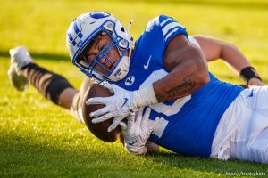 (Trent Nelson  |  The Salt Lake Tribune) Brigham Young Cougars linebacker AJ Vongphachanh (10) pulls in a fumbled ball, leading to a touchdown, as BYU hosts Texas Tech, NCAA football in Provo on Saturday, Oct. 21, 2023.