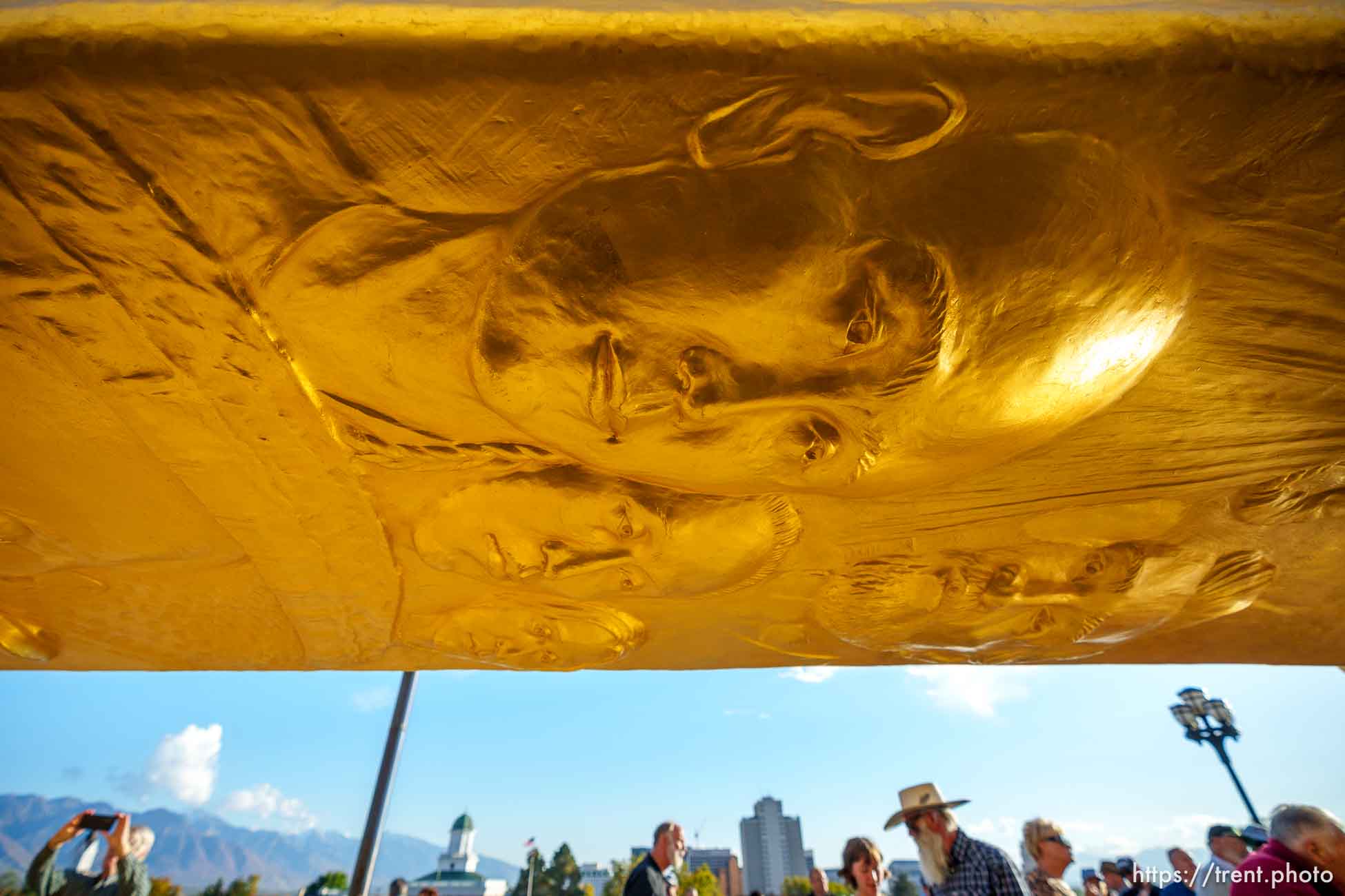 (Trent Nelson  |  The Salt Lake Tribune) Faces of railroad workers on a 43-foot-tall Golden Spike Monument on display at the State Capitol in Salt Lake City on Monday, Oct. 23, 2023.