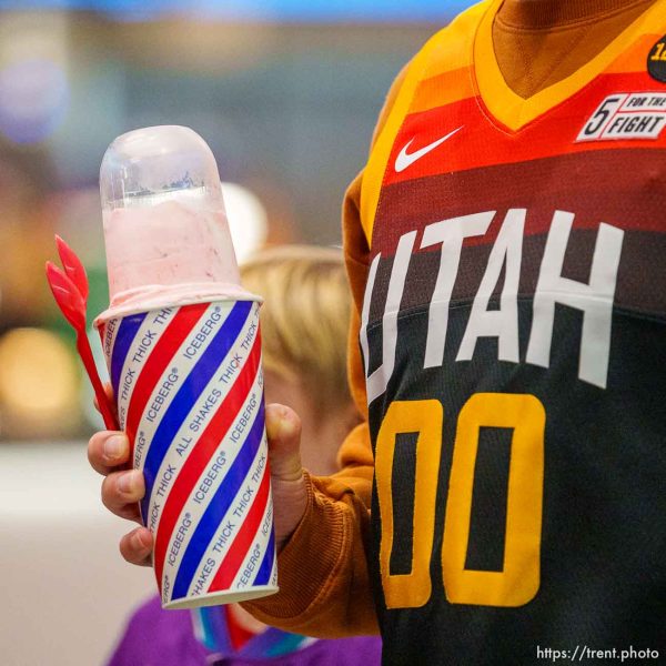 (Trent Nelson  |  The Salt Lake Tribune) A fan carries a milkshake as the Utah Jazz host the Memphis Grizzlies, NBA basketball in Salt Lake City on Wednesday, Nov. 1, 2023.