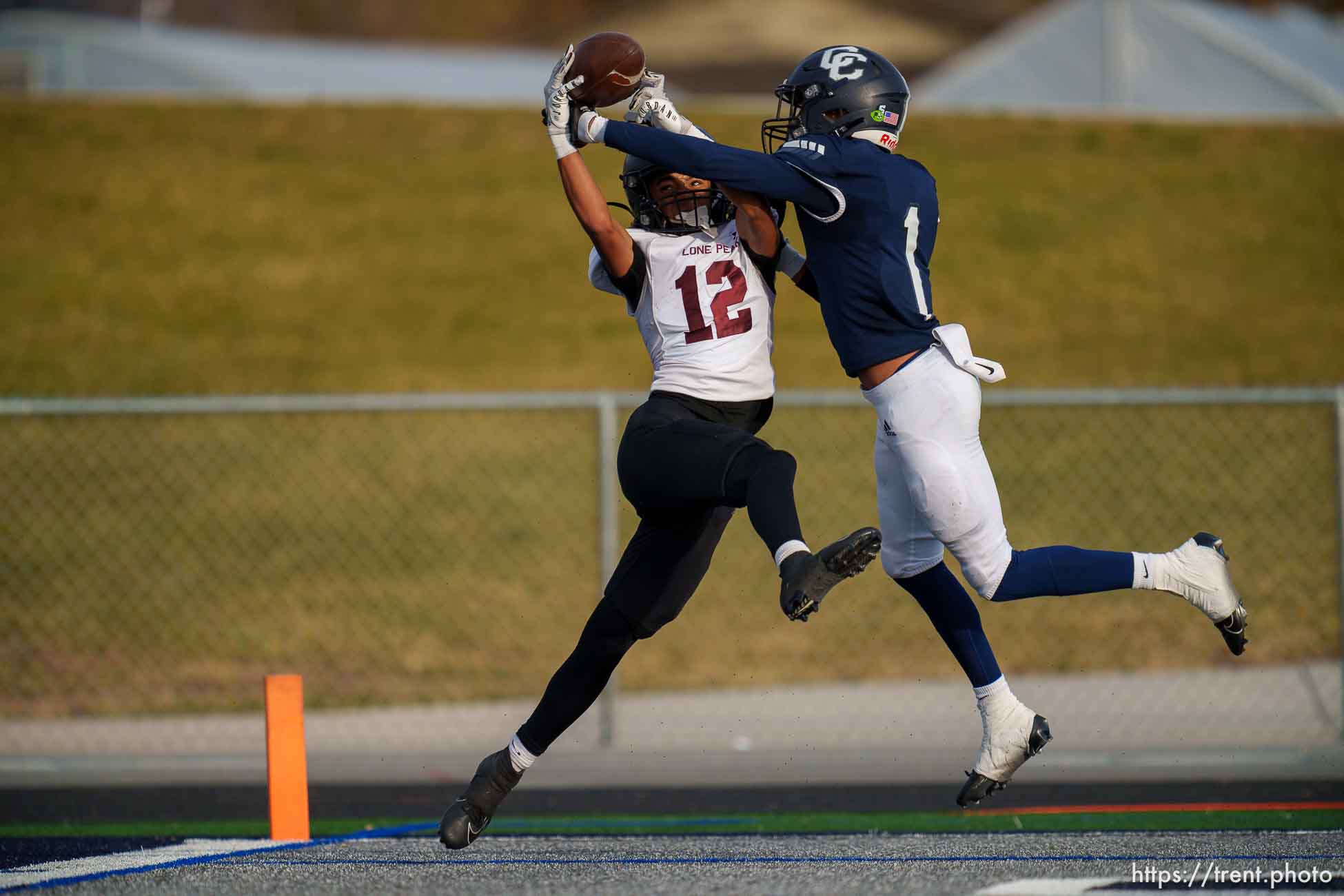 (Trent Nelson  |  The Salt Lake Tribune) Jasean Mayberry pulls in a touchdown as Corner Canyon High School hosts and beats Lone Peak in a 6A quarterfinals football game in Draper on Friday, Nov. 3, 2023.