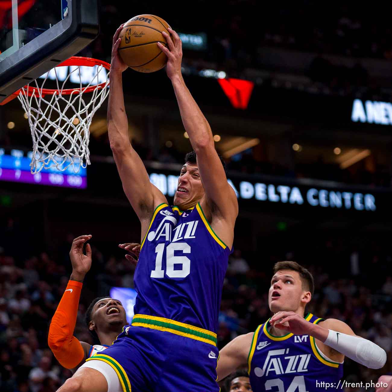 (Trent Nelson  |  The Salt Lake Tribune) Utah Jazz forward Simone Fontecchio (16) pulls down a rebound as the Utah Jazz host the New York Knicks, NBA basketball on Wednesday, Dec. 13, 2023.