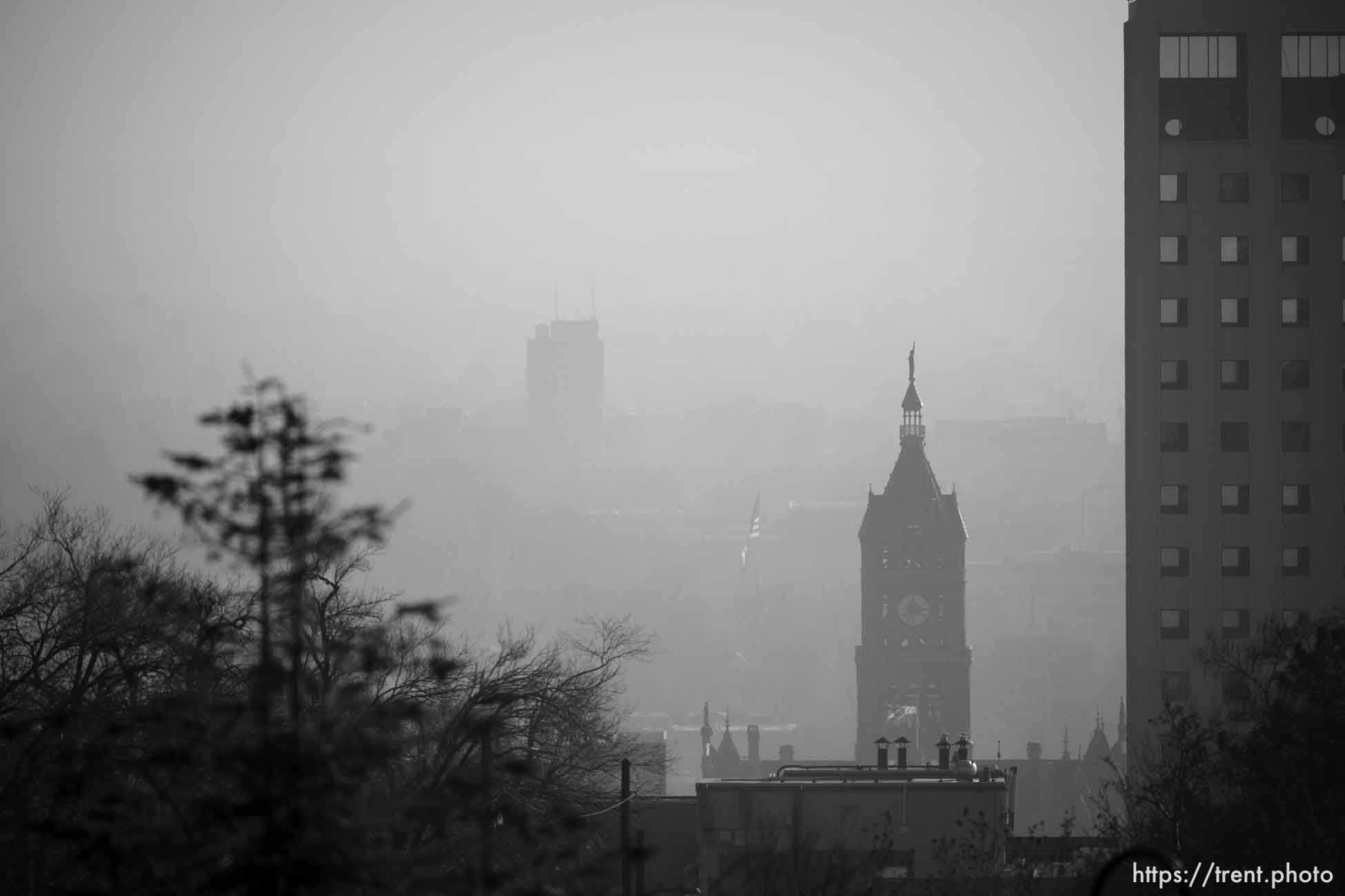 (Trent Nelson | The Salt Lake Tribune) Haze fills the air during an inversion in Salt Lake City on Thursday December 28, 2023.