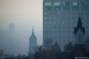 (Trent Nelson | The Salt Lake Tribune) Haze fills the air during an inversion in Salt Lake City on Thursday December 28, 2023.