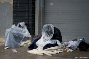 covered up from the rain, State Street, on Thursday, Jan. 25, 2024.