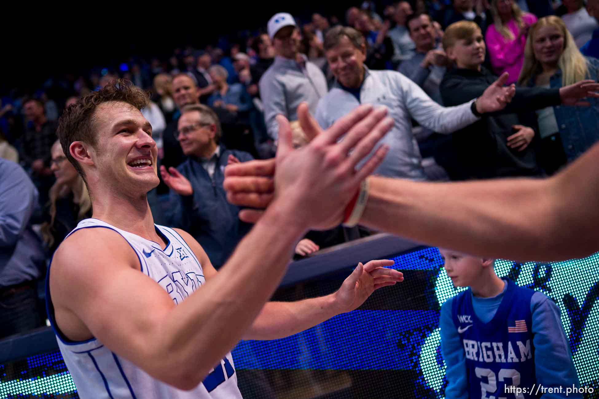 (Trent Nelson  |  The Salt Lake Tribune) Brigham Young Cougars guard Trevin Knell (21) celebrates the win as BYU hosts Baylor, NCAA basketball in Provo on Tuesday, Feb. 20, 2024.