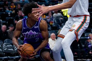 (Trent Nelson  |  The Salt Lake Tribune) Utah Jazz guard Collin Sexton (2) defended by San Antonio Spurs center Victor Wembanyama (1) as the Utah Jazz host the San Antonio Spurs, NBA basketball in Salt Lake City on Sunday, Feb. 25, 2024.