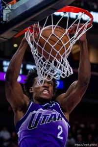 (Trent Nelson  |  The Salt Lake Tribune) Utah Jazz guard Collin Sexton (2) dunks as the Utah Jazz host the San Antonio Spurs, NBA basketball in Salt Lake City on Sunday, Feb. 25, 2024. San Antonio Spurs center Victor Wembanyama (1) at right.